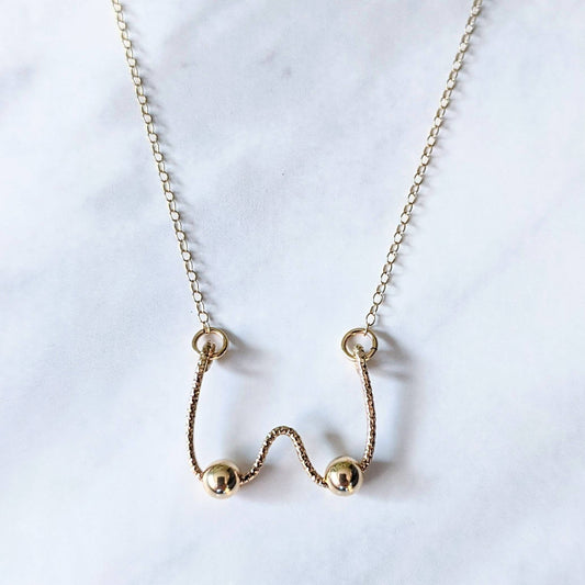 Gold Boob Necklace